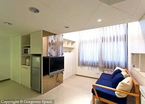 多功能23平米蜗居 实现7坪超强收纳空间(组图) -家居快讯-北京搜房装修家居网